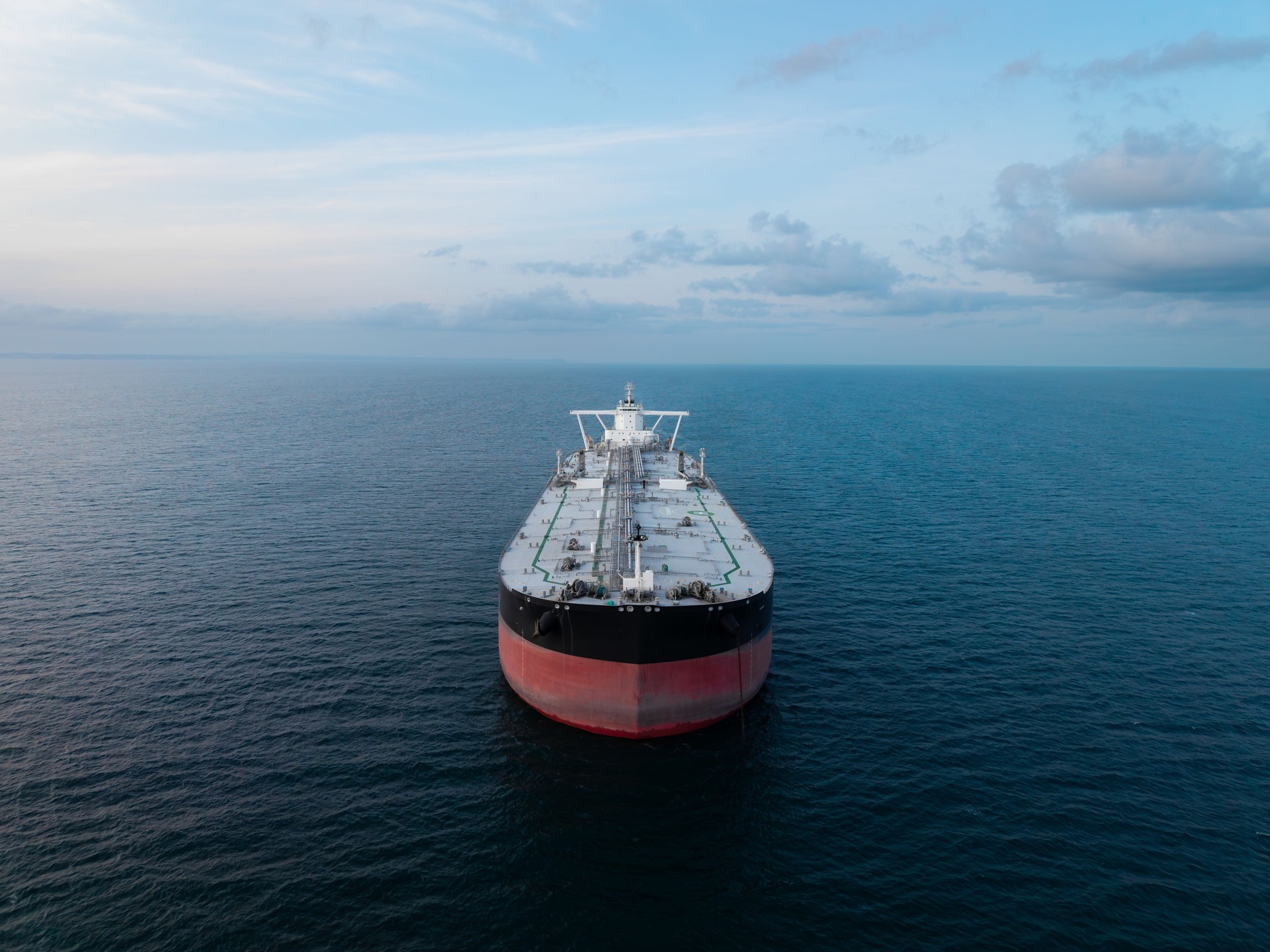 Aerial view of the front of a large crude oil tanker ship at sea